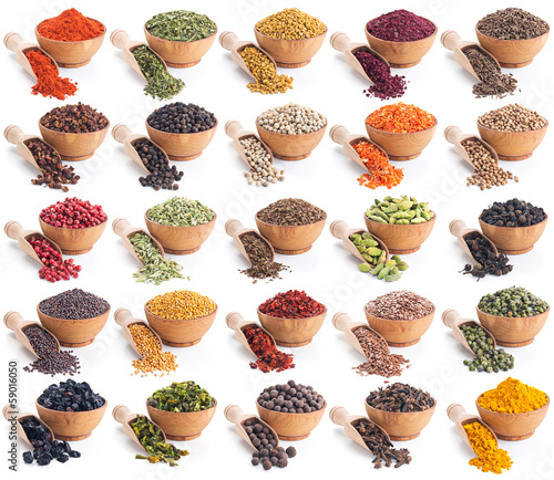 collection of different spices and herbs isolated on white