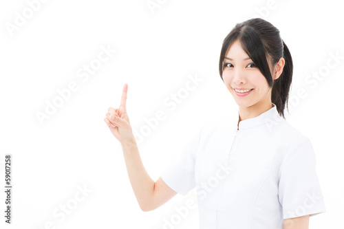 young asian nurse showing on white background