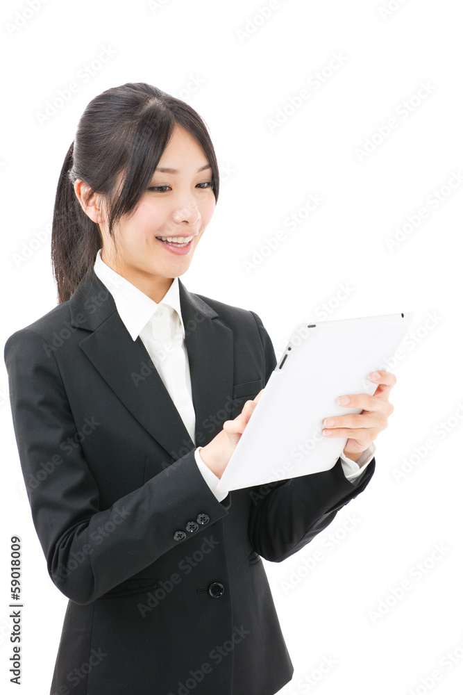 asian businesswoman using tablet on white background asian businesswoman using tablet on white background