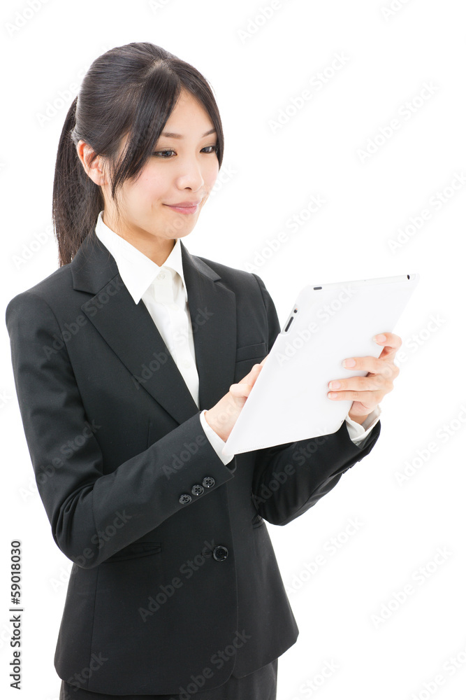 asian businesswoman using tablet on white background asian businesswoman using tablet on white background