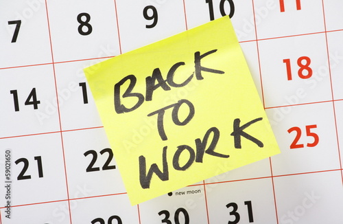 Back to Work reminder on a wall calendar