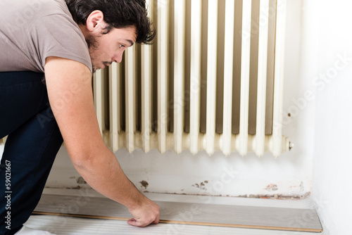 young man bricolage working