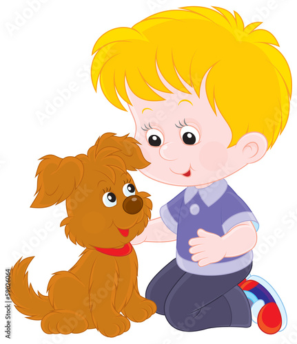 boy playing with a brown puppy