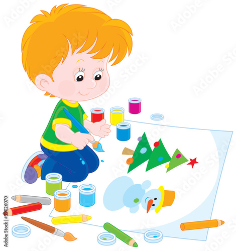 boy drawing a picture to Christmas