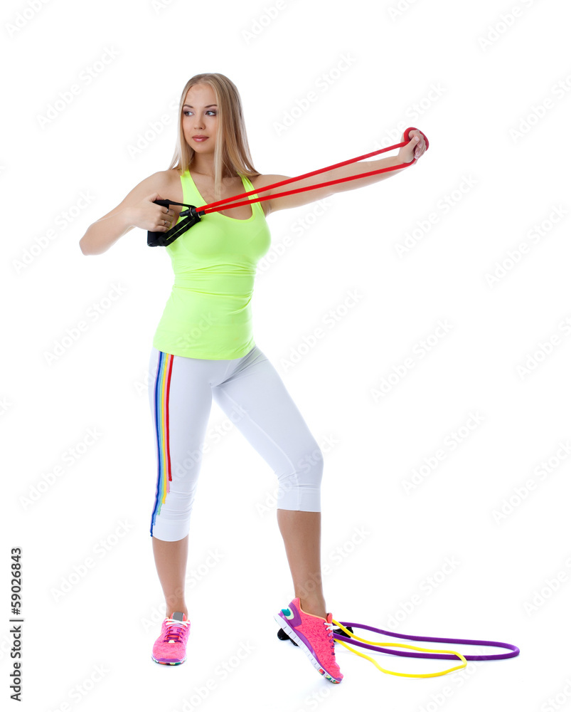 Pretty girl exercising with gymnastic simulator Pretty girl exercising with gymnastic simulator