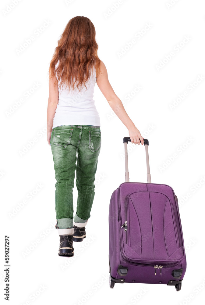 back view of walking woman with suitcase back view of walking woman with suitcase