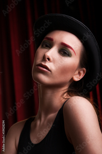 attractive female in bowler hat