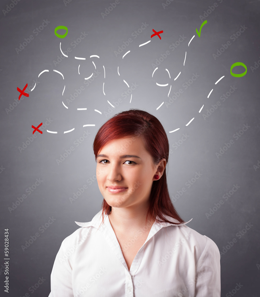 Young woman thinking with abstract marks overhead Young woman thinking with abstract marks overhead