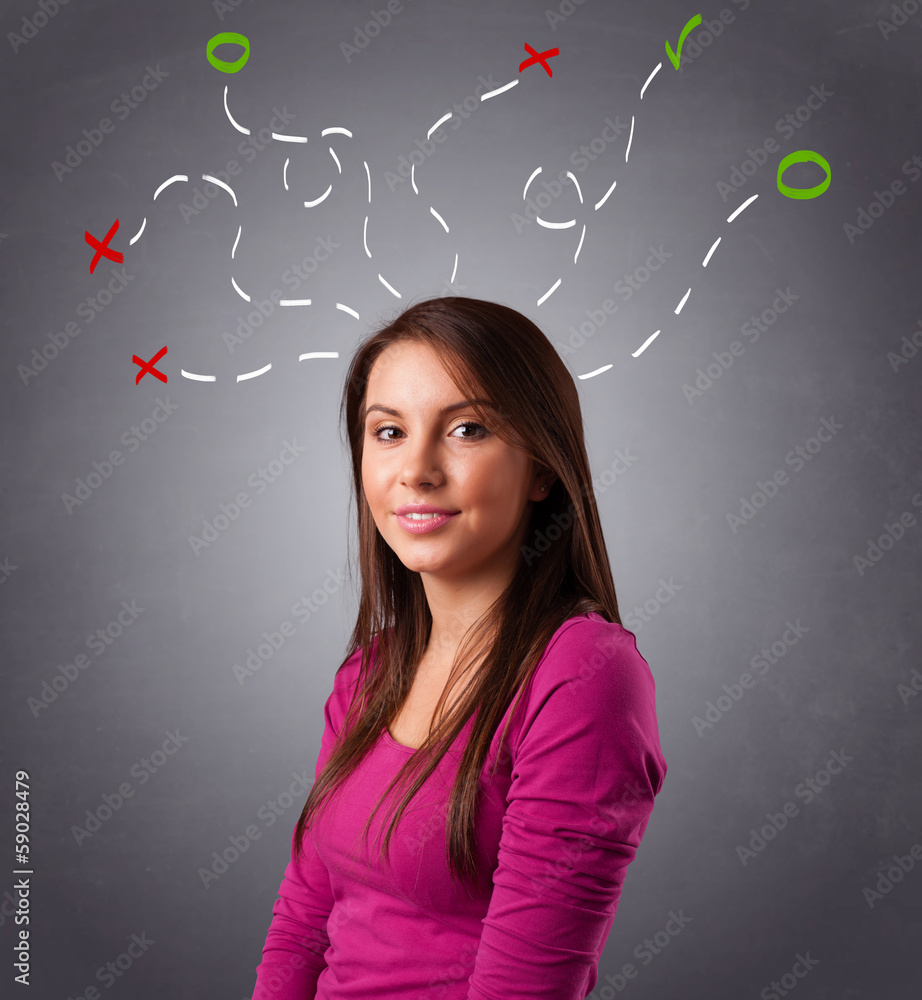 Young woman thinking with abstract marks overhead Young woman thinking with abstract marks overhead