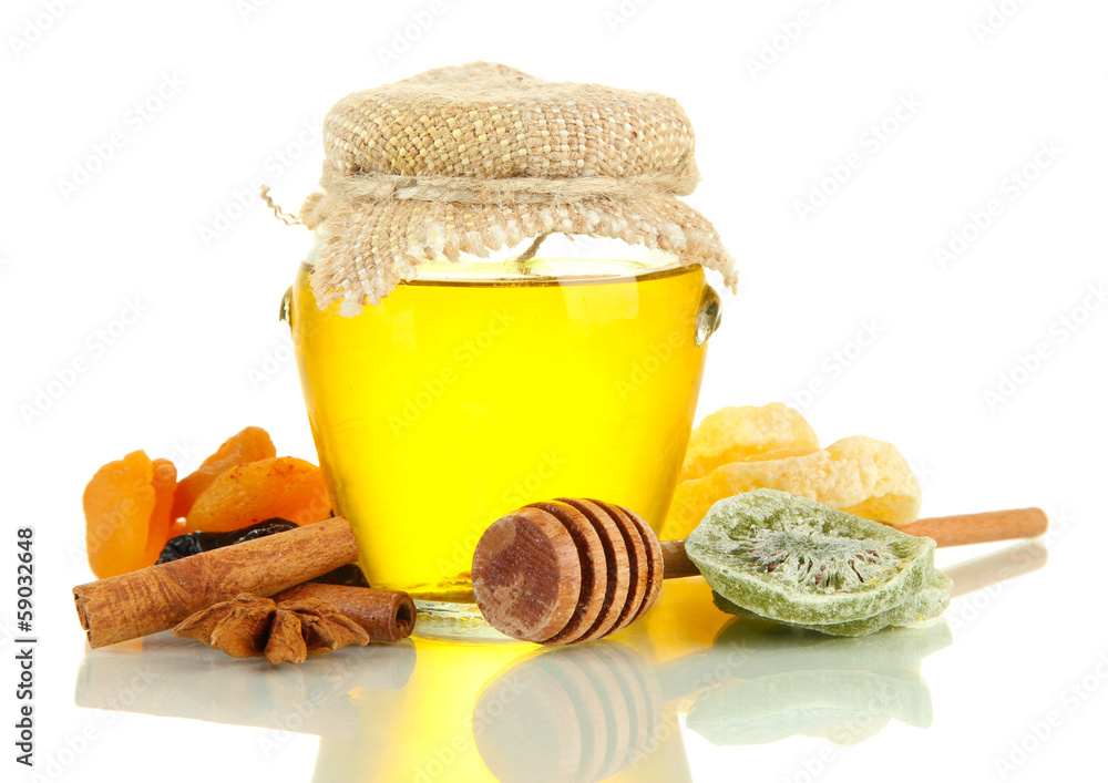 Jar of honey and dried fruits isolated on white Jar of honey and dried fruits isolated on white