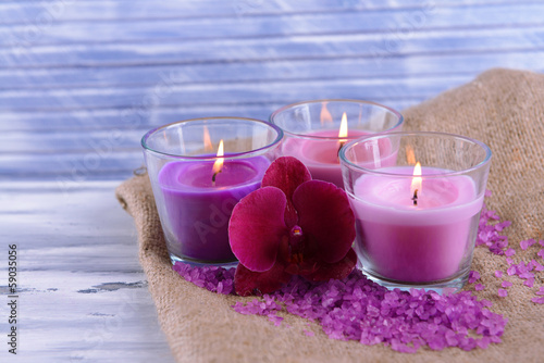 Fototapeta Naklejka Na Ścianę i Meble -  Composition with beautiful colorful candles, sea salt and