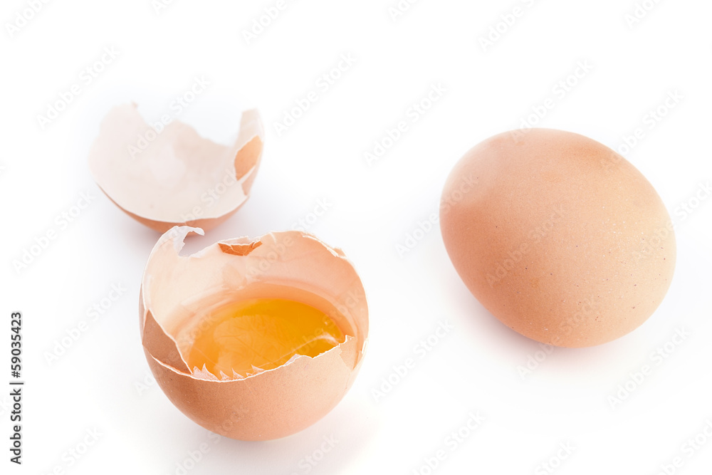 Broken egg with an open shell. On a white background. Broken egg with an open shell. On a white background.