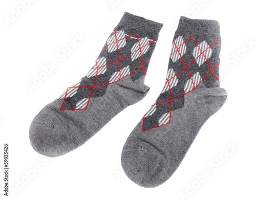 Pair of warm woolen socks. On a white background.