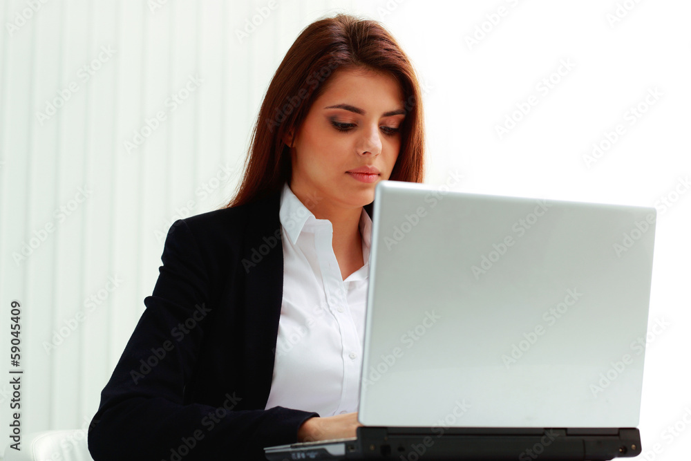 young concentrated businesswoman looking young concentrated businesswoman looking