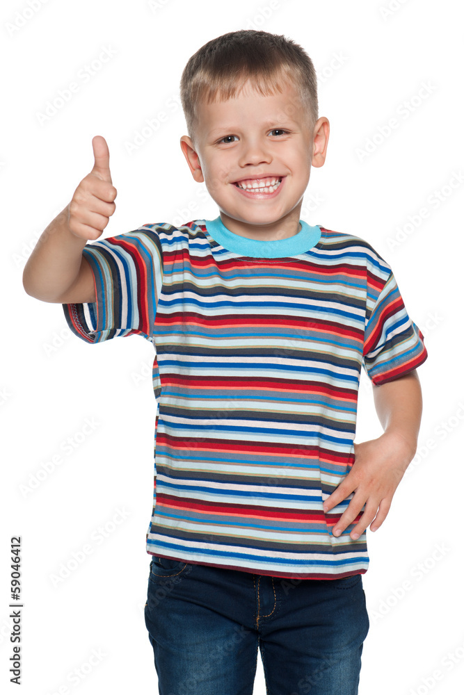 Little boy in striped shirt holds his thumb up Little boy in striped shirt holds his thumb up