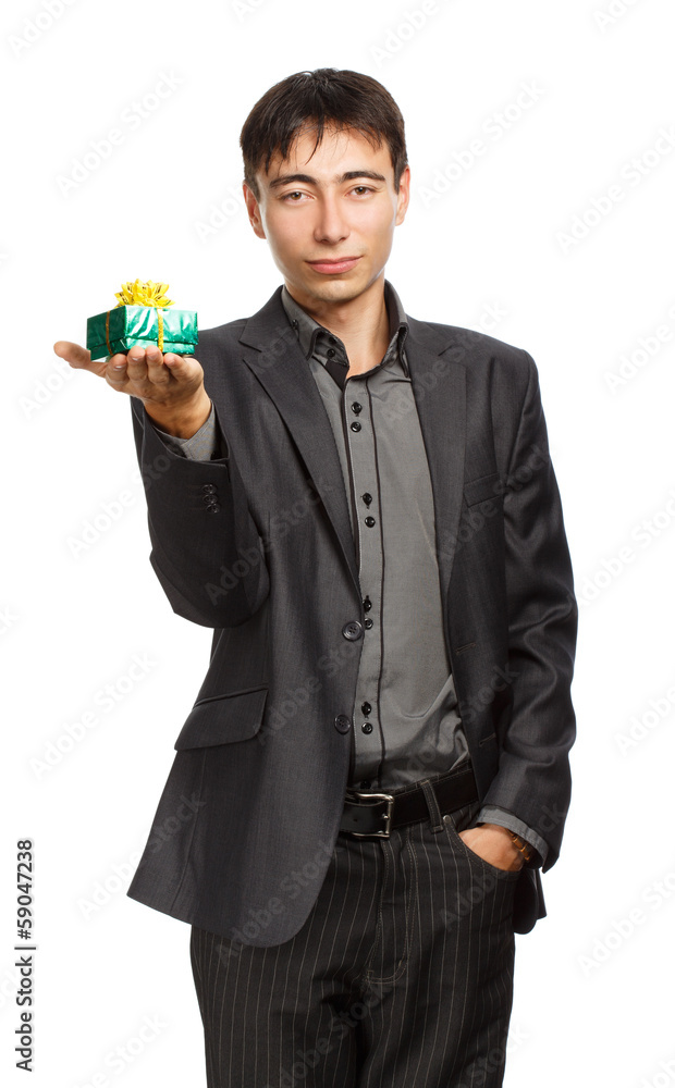 Businessman with gift box in hand Businessman with gift box in hand