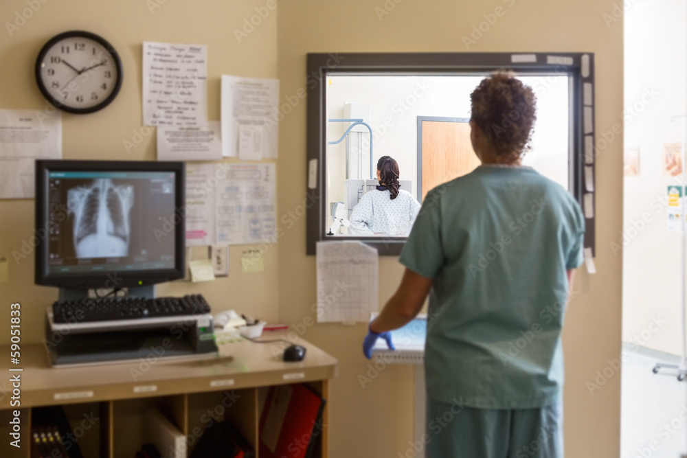 Nurse Operating Machine In Xray Room Nurse Operating Machine In Xray Room