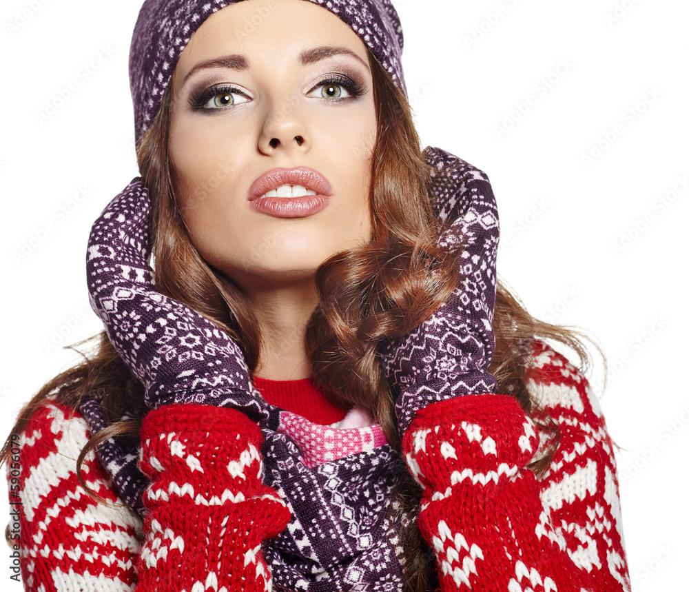 Naklejka premium beautiful woman in warm clothing on white background