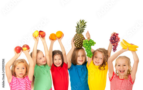 Happy children with fruits