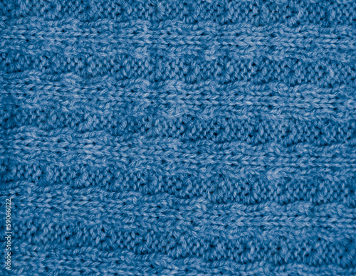 blue knitted fabric as a background. macro