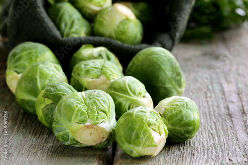 fresh raw organic green brussel sprouts photo