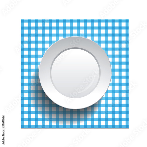 white plate on a checkered tablecloth