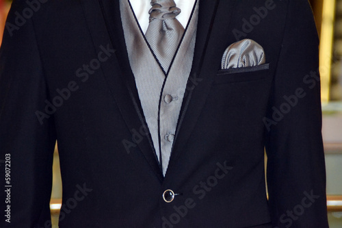 Man with black and gray suit photo