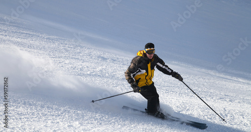 Skier on mountain slope