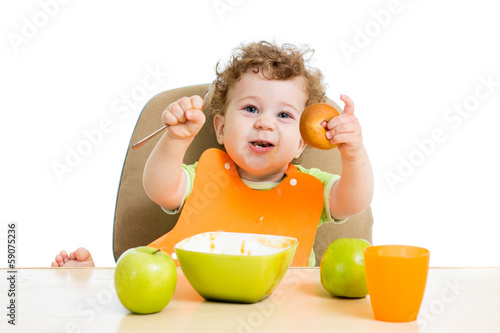 baby eating by himself