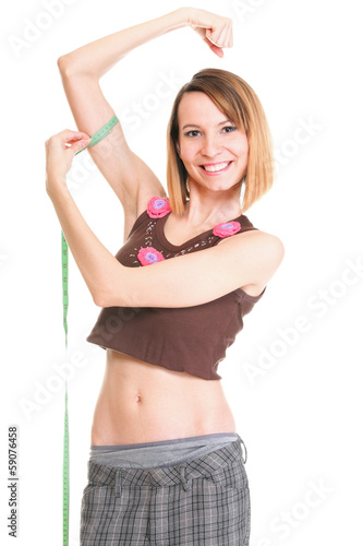 Fitness woman jumping excited isolated female smiling showing mu © anetlanda
