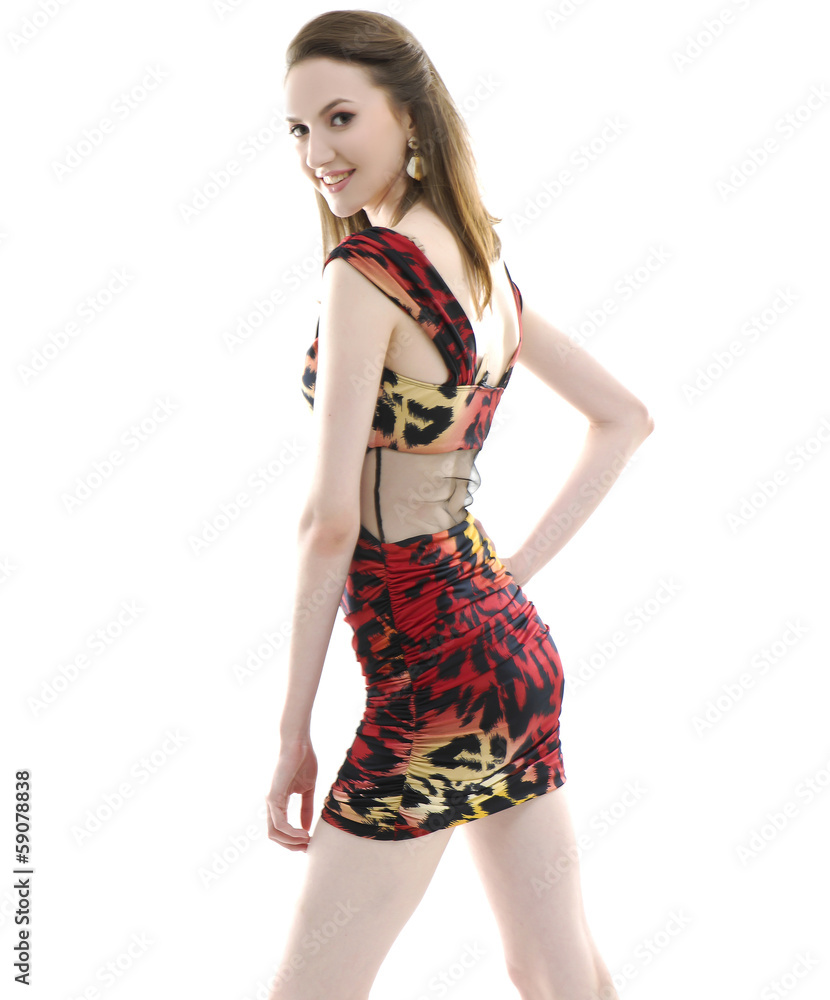 young beautiful girl in mini dress posing