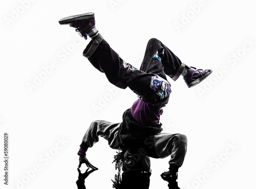 hip hop acrobatic break dancer breakdancing young man handstand photo