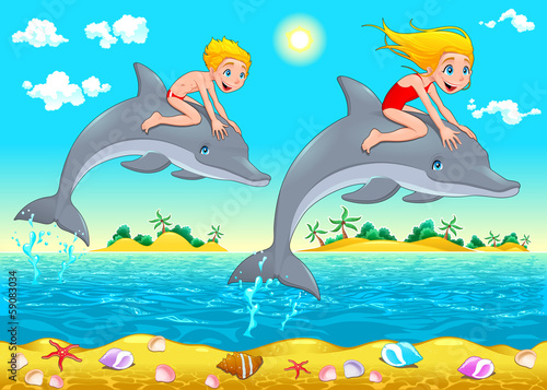 Boy, girl and dolphin in the sea.