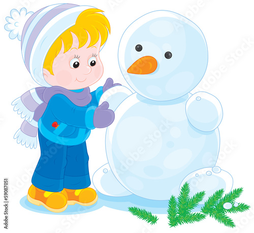 Little boy or girl making a funny snowman