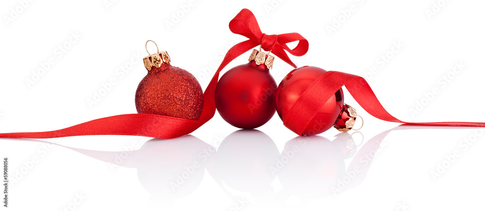 Three Red Christmas balls with ribbon bow Isolated on white back