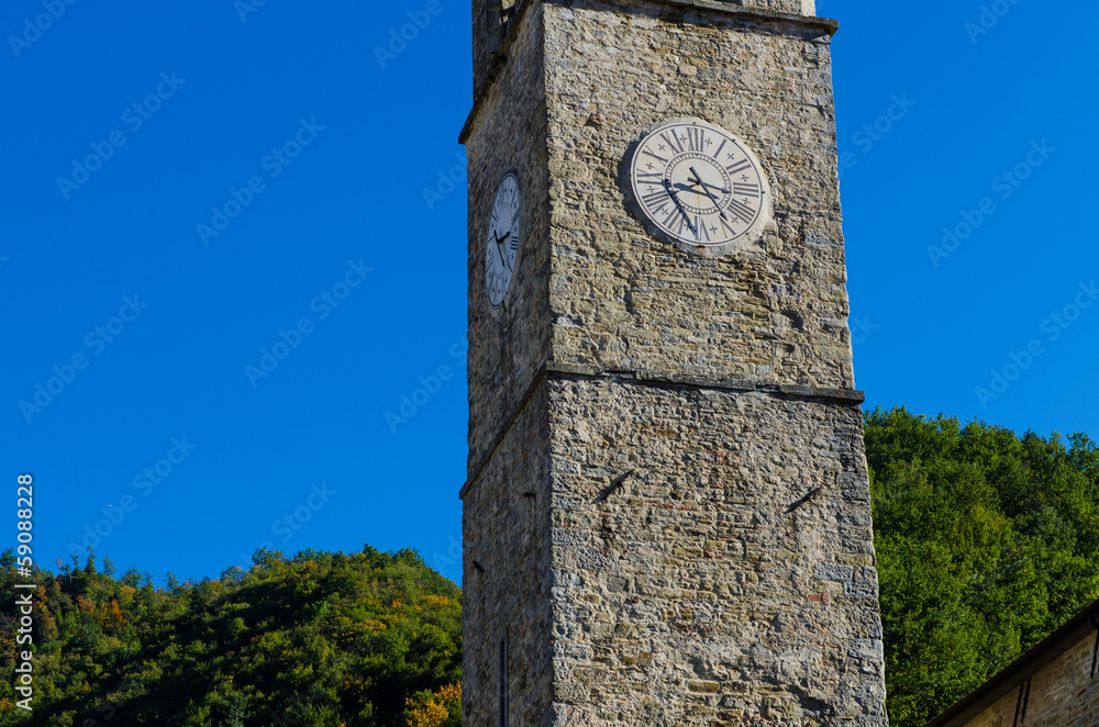 ancient stone tower with clock