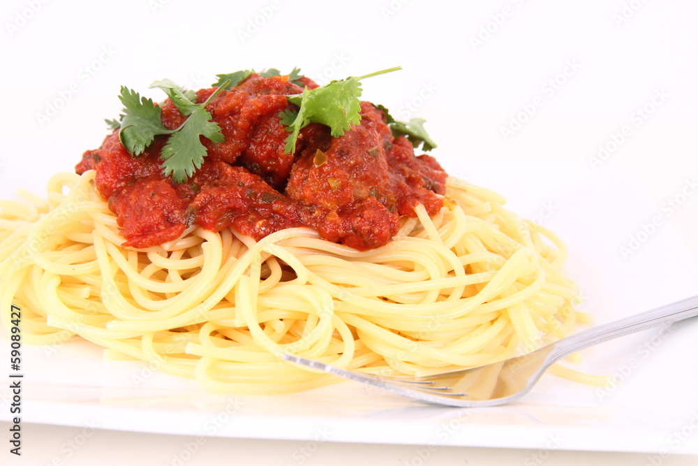 Pasta with meatballs decorated with coriander Pasta with meatballs decorated with coriander