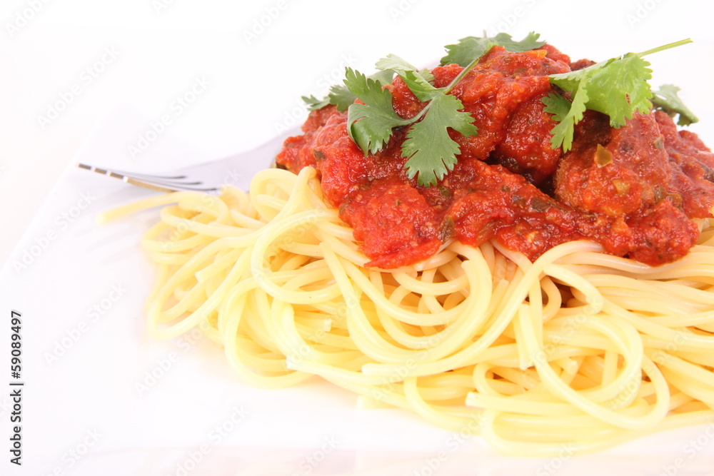 Pasta with meatballs decorated with coriander Pasta with meatballs decorated with coriander