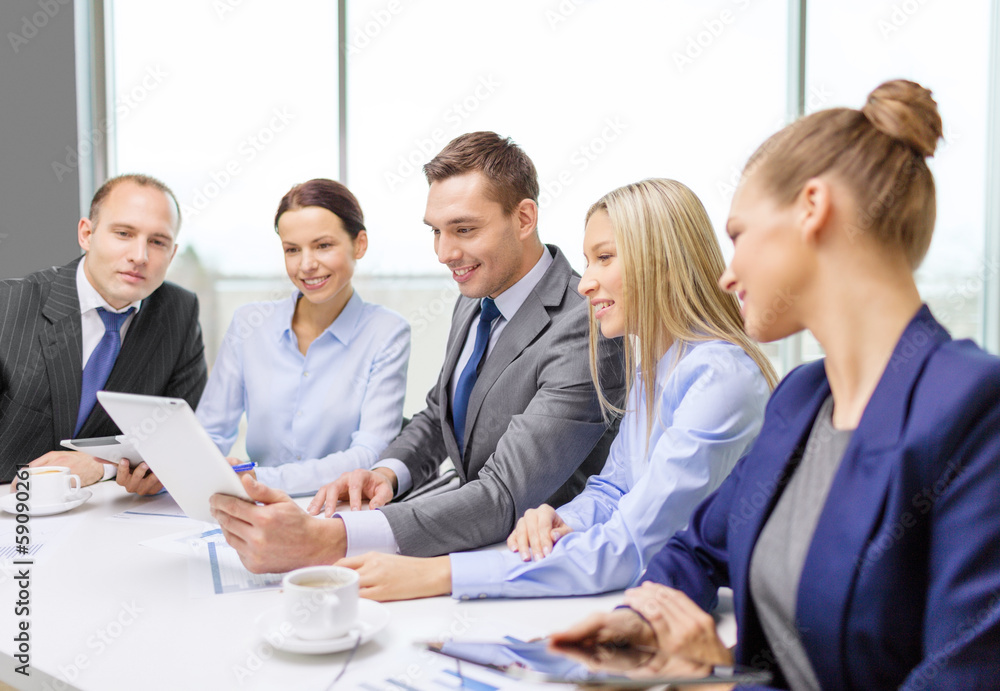 business team with tablet pc having discussion business team with tablet pc having discussion