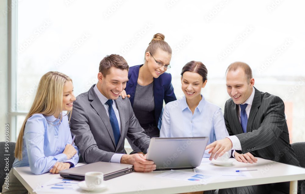 business team with laptop having discussion business team with laptop having discussion