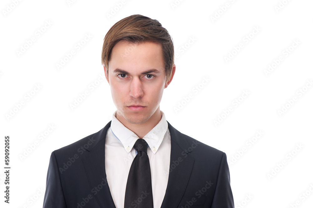 Young business man with serious expression on his face Young business man with serious expression on his face