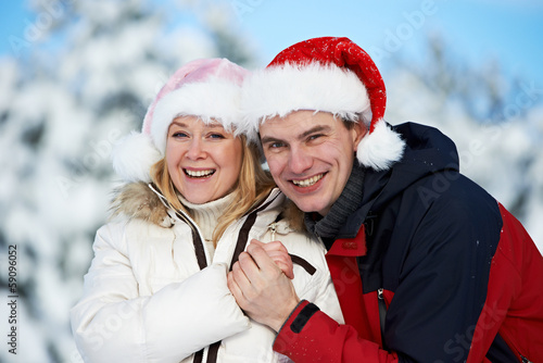 happy family couple in winter