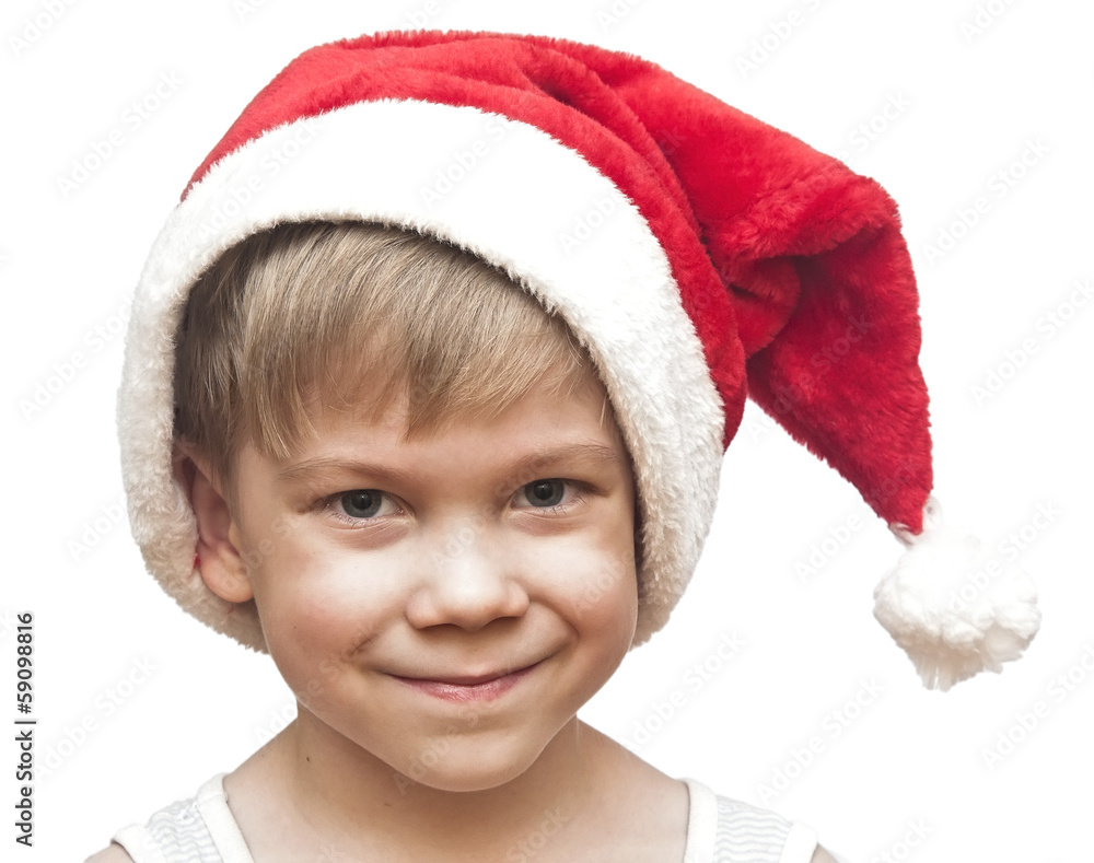 little boy in red santa hat isolated on white little boy in red santa hat isolated on white