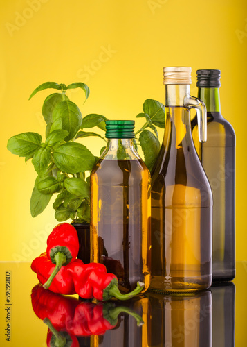 olive oil bottle ,basile and red paprika