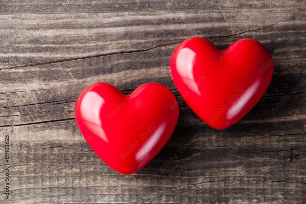 Two red hearts on Valentine's Day background with copyspace Two red hearts on Valentine's Day background with copyspace