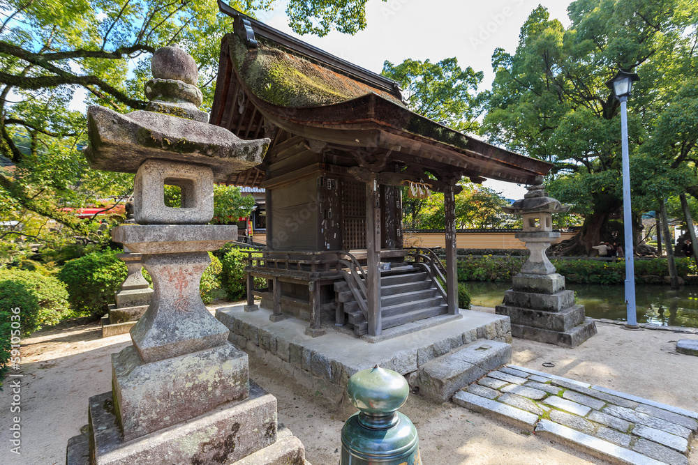 Fukuoka, Japan - November 13 2013: A small wood shrine in the Da Fukuoka, Japan - November 13 2013: A small wood shrine in the Da