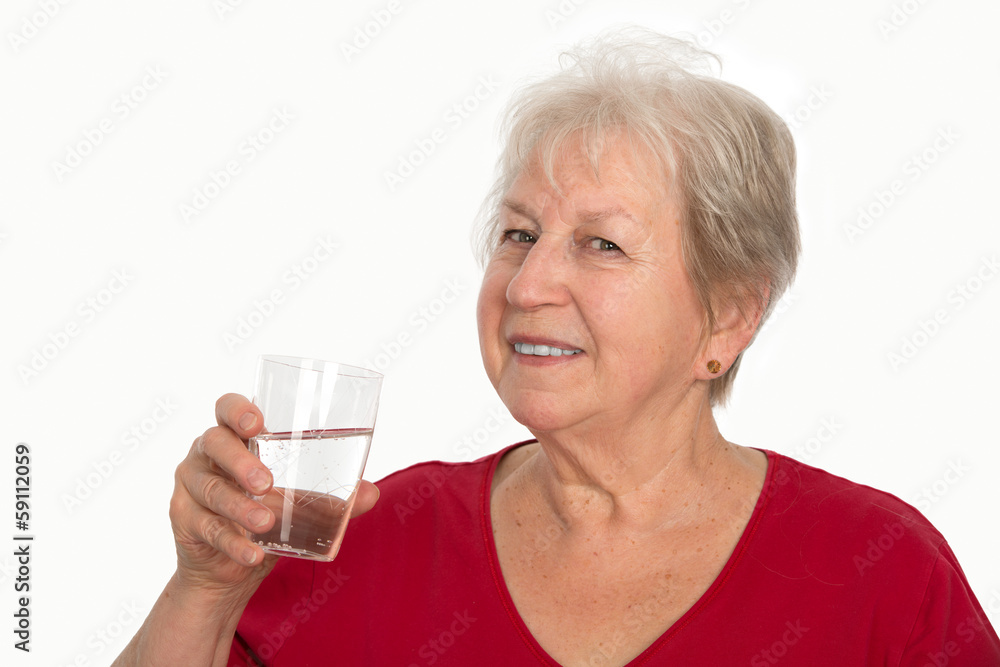 smiling elderly woman is drinking water smiling elderly woman is drinking water