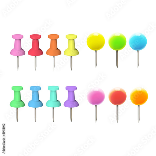 Colorful pushpins over white background.