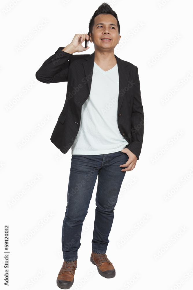 Cool businessman talking on mobile phone Cool businessman talking on mobile phone