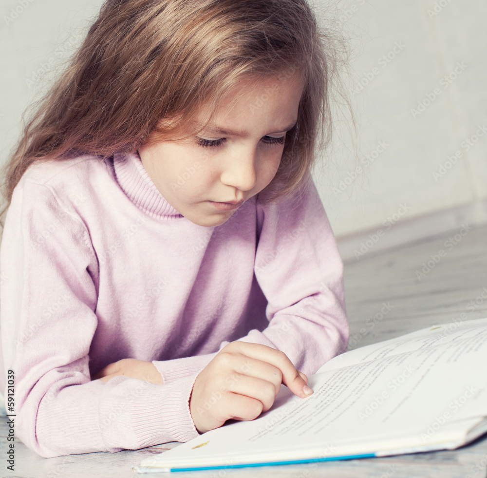 Child reading book Child reading book
